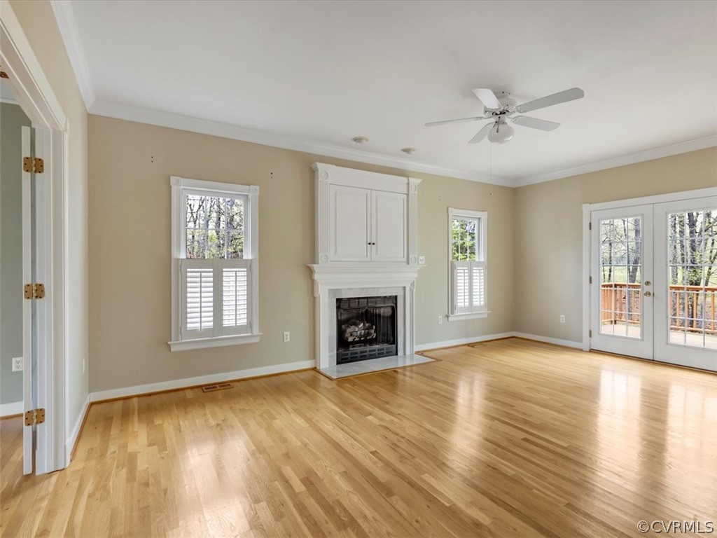 16219 Dragonnade Trail Midlothian, VA 23113 - Photo 11 of 39 a view of a livingroom with a fireplace window and wooden floor