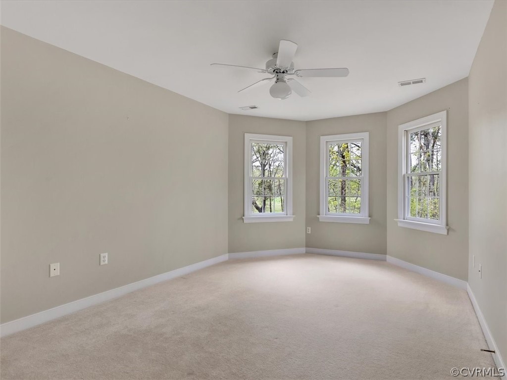16219 Dragonnade Trail Midlothian, VA 23113 - Photo 28 of 39 a view of an empty room with a window