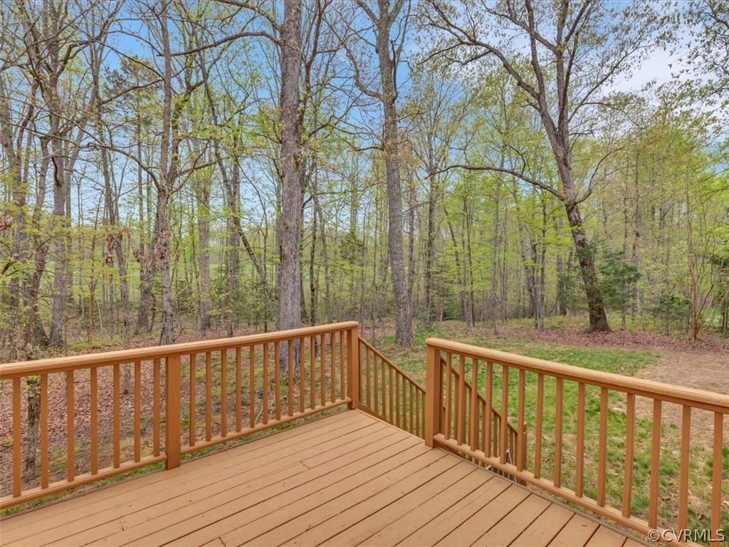 16219 Dragonnade Trail Midlothian, VA 23113 - Photo 36 of 39 a view of balcony with wooden floor and fence