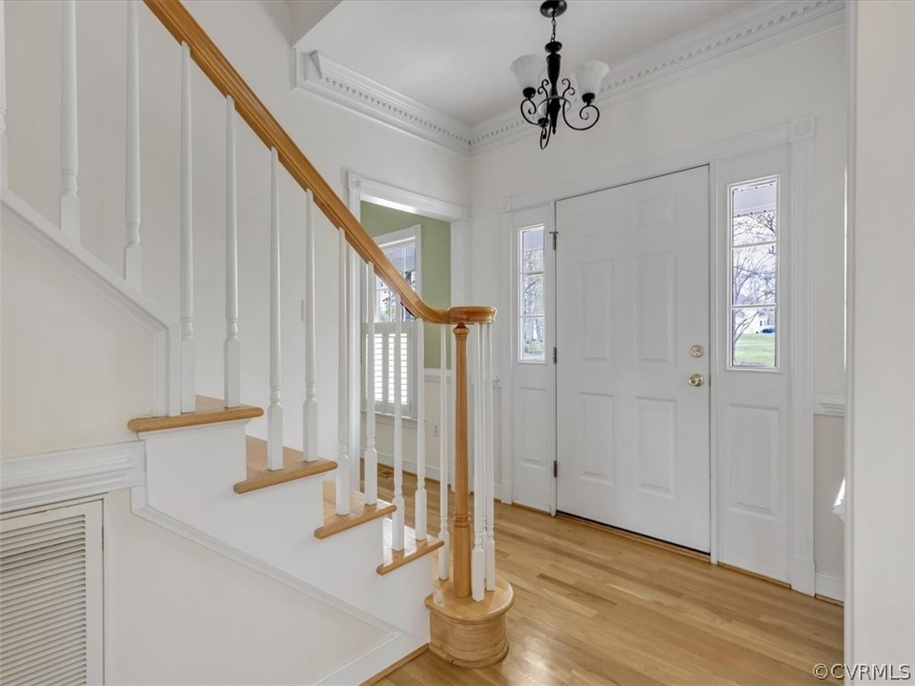 16219 Dragonnade Trail Midlothian, VA 23113 - Photo 6 of 39 a view of entryway and hall with wooden floor