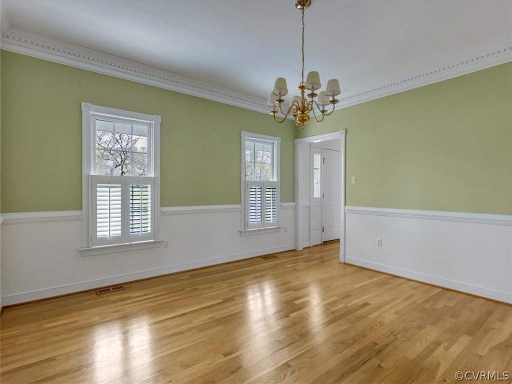 16219 Dragonnade Trail Midlothian, VA 23113 - Photo 10 of 39 a view of an empty room with a window and wooden floor