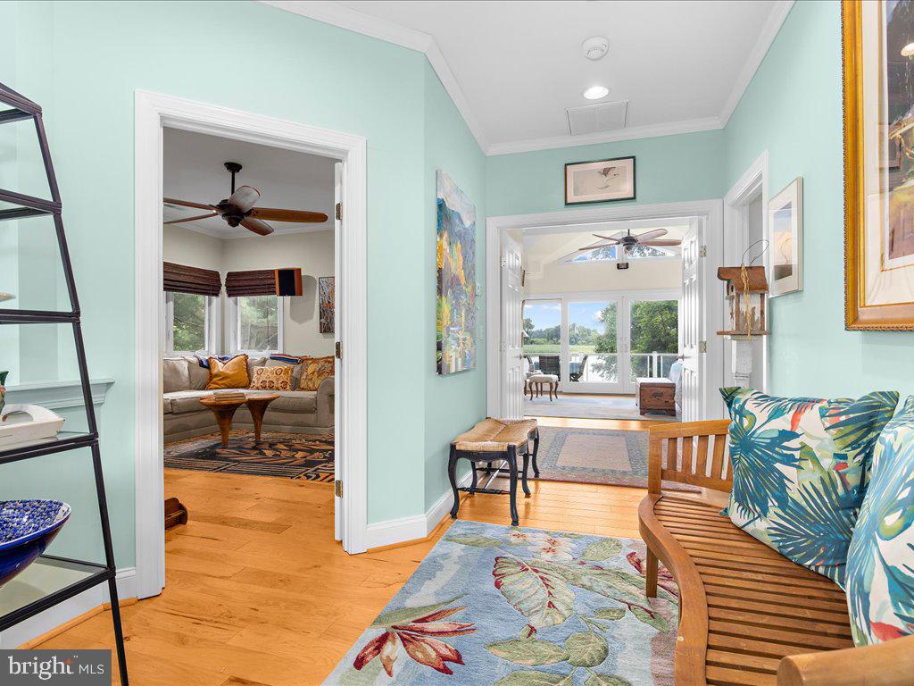 720 Southeast Creek Road Church Hill, MD 21623 - Photo 11 of 53 a living room with furniture and a table