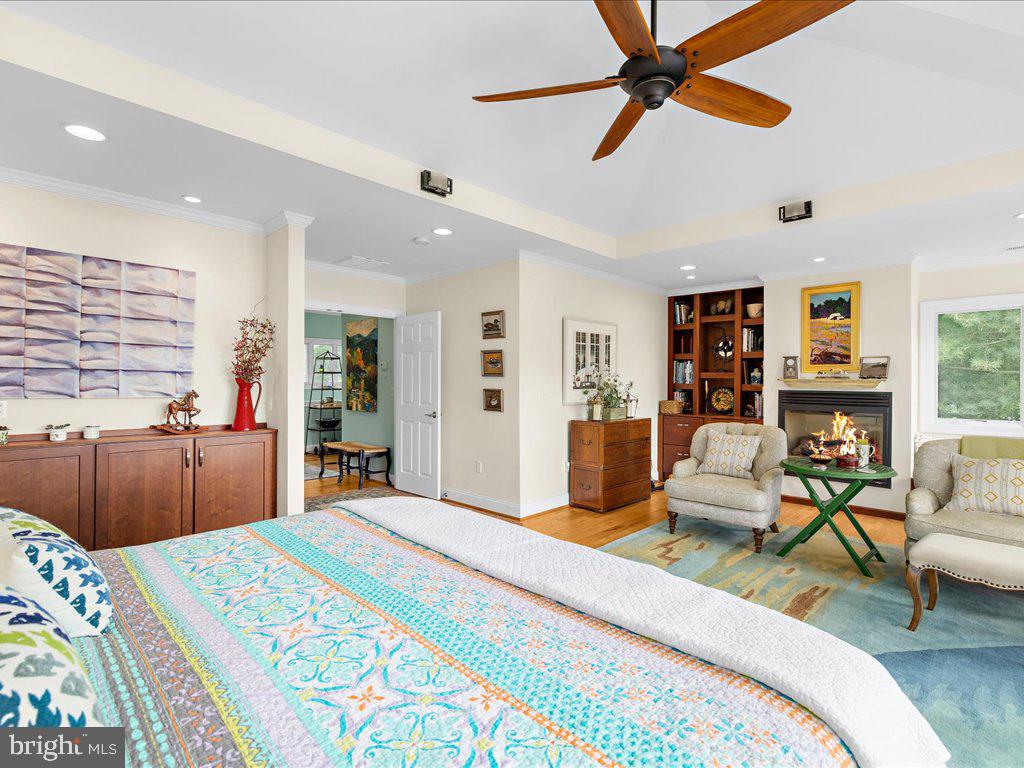 720 Southeast Creek Road Church Hill, MD 21623 - Photo 12 of 53 a bedroom with a bed a couch and dresser