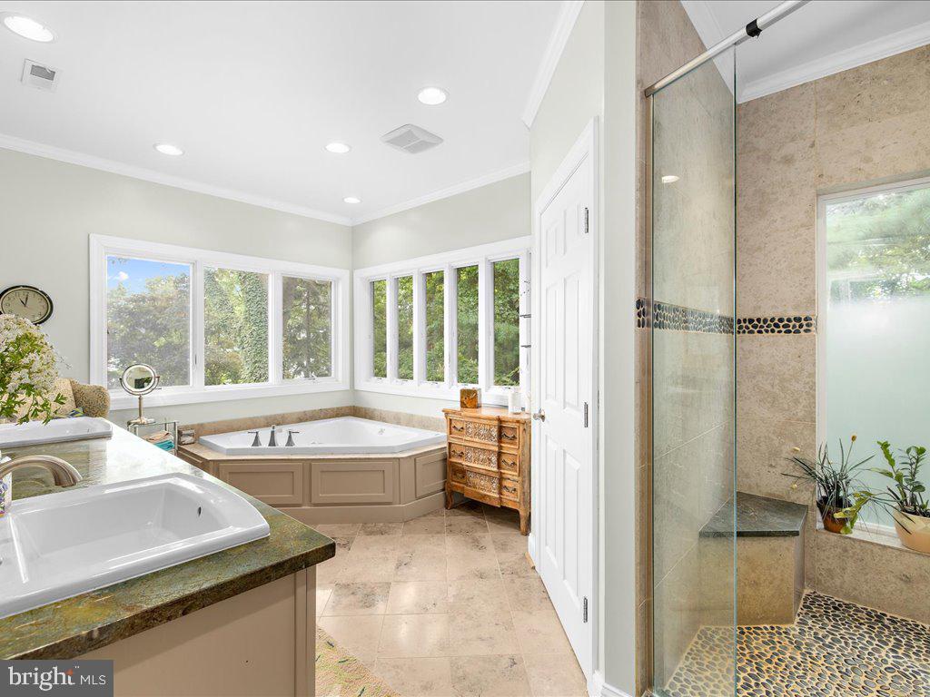 720 Southeast Creek Road Church Hill, MD 21623 - Photo 14 of 53 a spacious bathroom with a tub and sink
