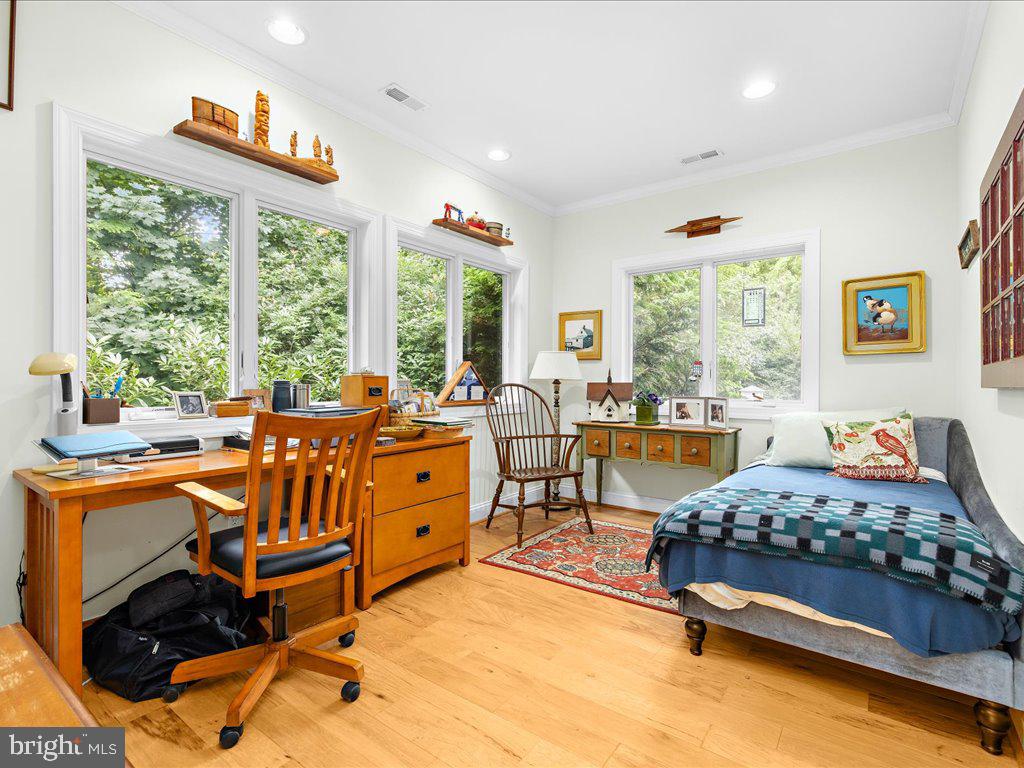 720 Southeast Creek Road Church Hill, MD 21623 - Photo 18 of 53 a bedroom with furniture and a large window