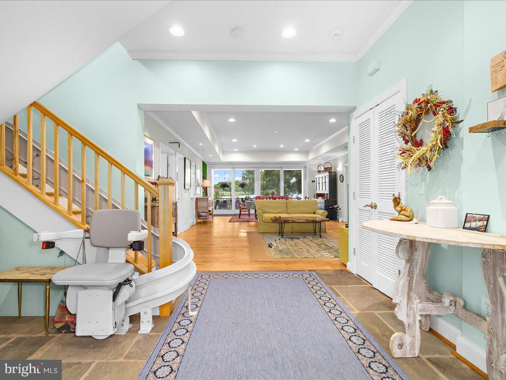 720 Southeast Creek Road Church Hill, MD 21623 - Photo 53 of 53 a living room with fireplace furniture and a potted plant