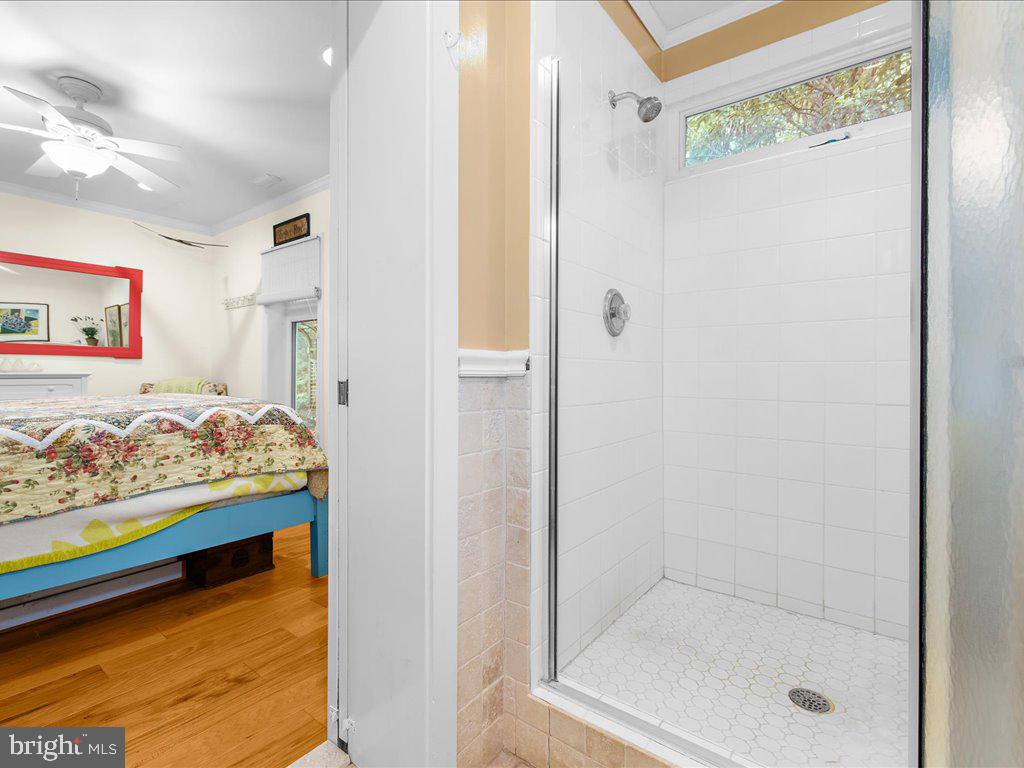 720 Southeast Creek Road Church Hill, MD 21623 - Photo 24 of 53 a bedroom with a bed and a window