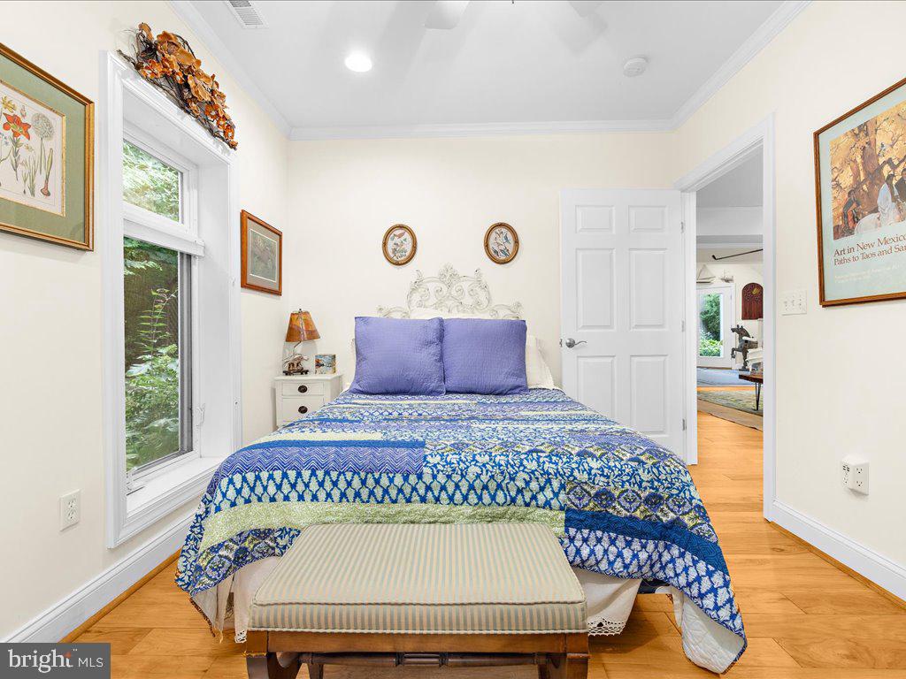 720 Southeast Creek Road Church Hill, MD 21623 - Photo 27 of 53 a room with a bed and window