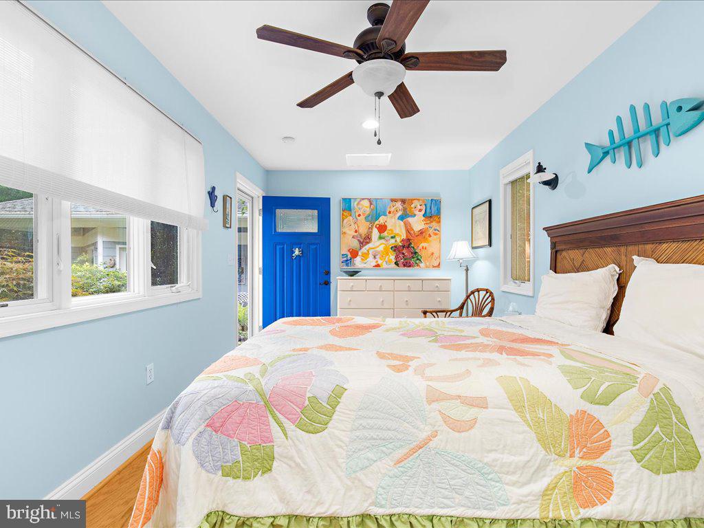 720 Southeast Creek Road Church Hill, MD 21623 - Photo 35 of 53 a bedroom with a bed and a large window