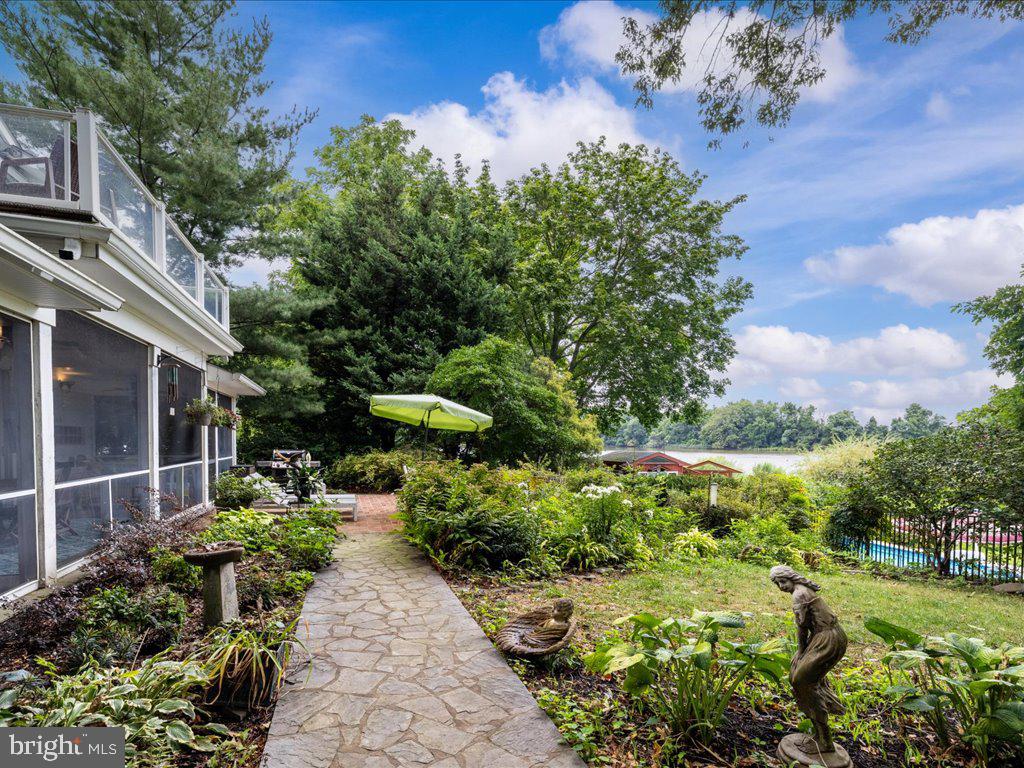 720 Southeast Creek Road Church Hill, MD 21623 - Photo 40 of 53 a view of a garden with pathway
