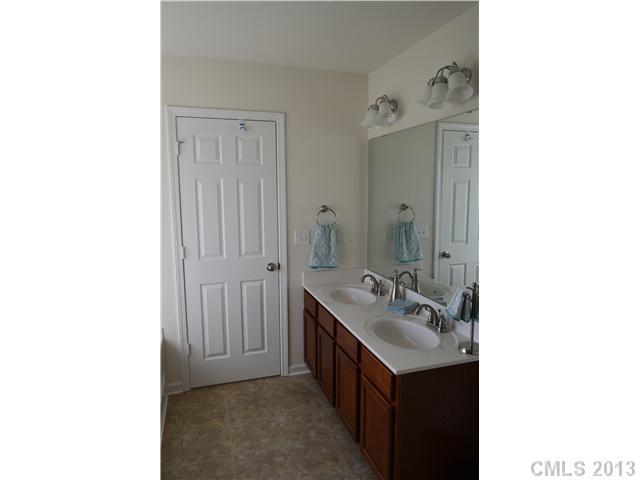 9227 Yellow Oak Road Charlotte, NC 28227 - Photo 13 of 16 a bathroom with a sink and a mirror