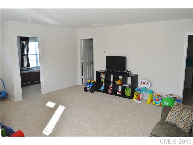 9227 Yellow Oak Road Charlotte, NC 28227 - Photo 16 of 16 a living room with furniture and a flat screen tv