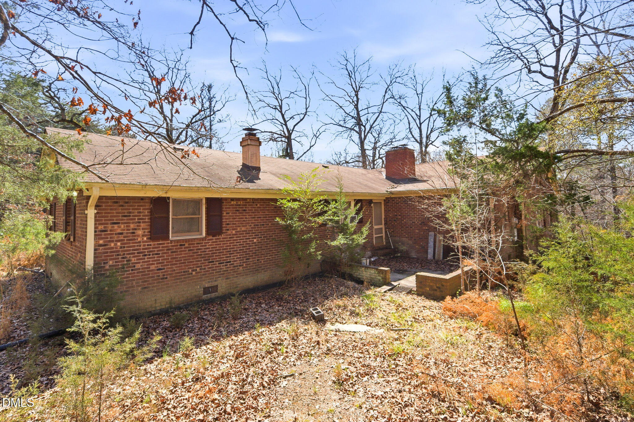 1603 Sykes Road Mebane, NC 27302 - Photo 41 of 45 a front view of a house with a yard