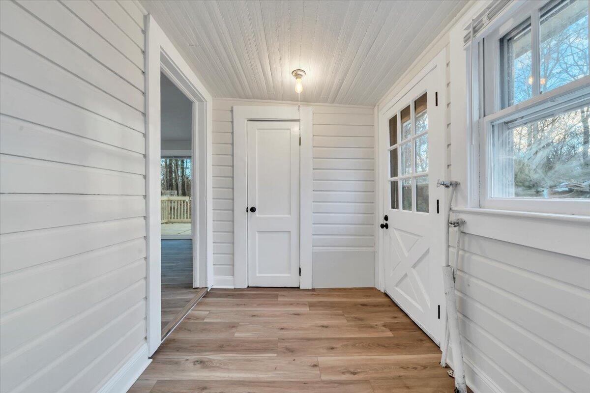 55 Black Feather Trail Ridgeway, VA 24148 - Photo 17 of 35 a view of a hallway with wooden floor and staircase