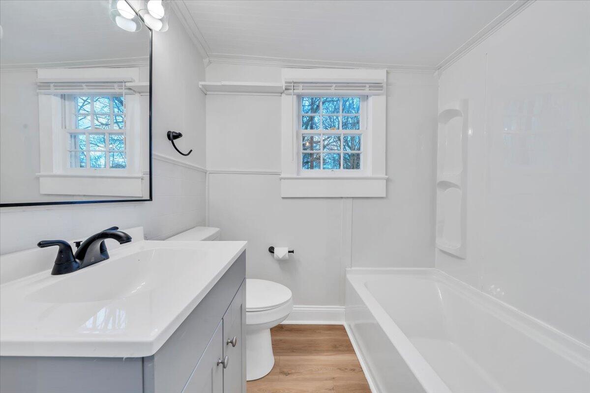 55 Black Feather Trail Ridgeway, VA 24148 - Photo 19 of 35 a bathroom with a sink a toilet and bathtub