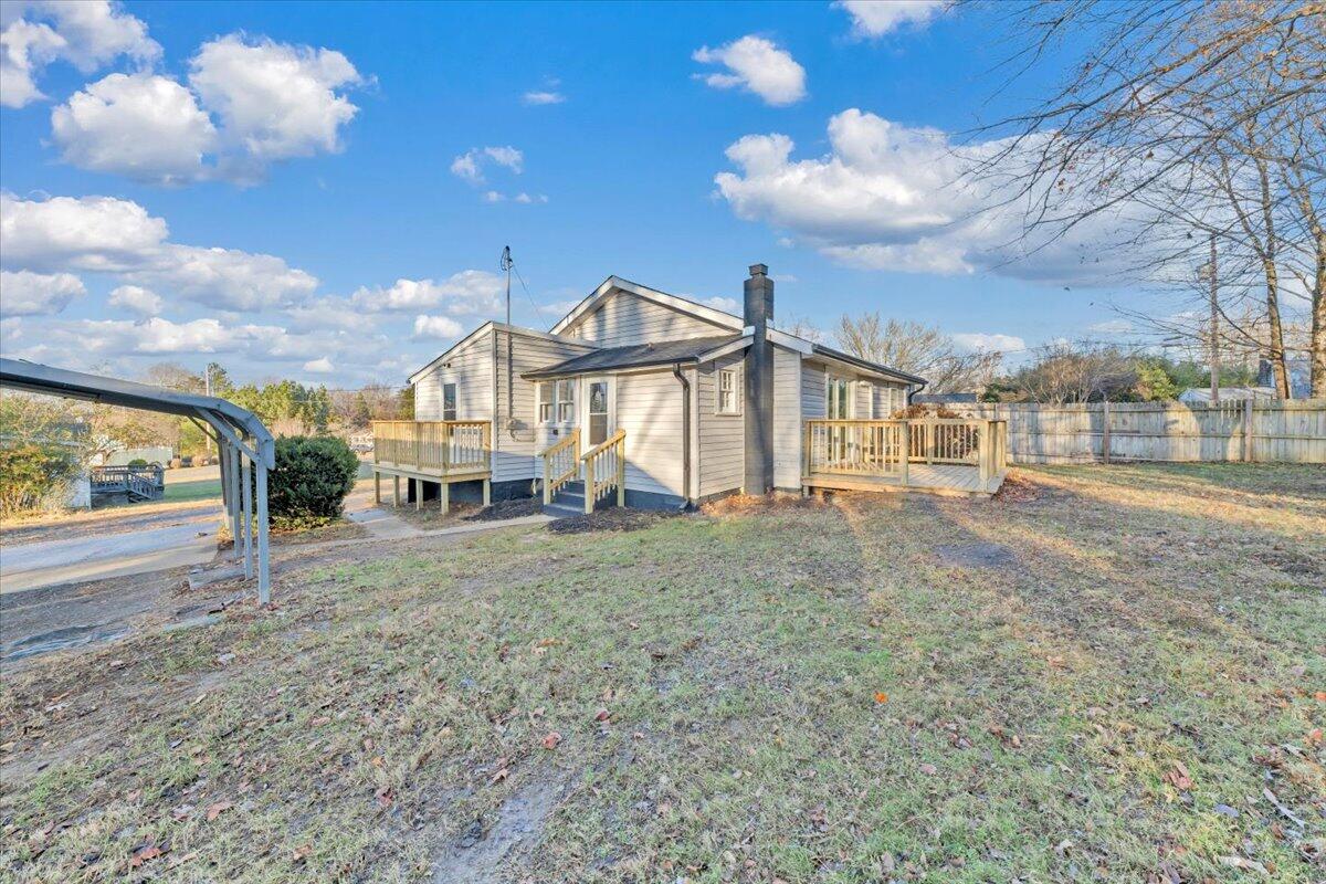 55 Black Feather Trail Ridgeway, VA 24148 - Photo 28 of 35 a view of a big house with a big yard and large tree