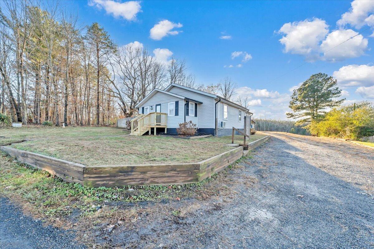 55 Black Feather Trail Ridgeway, VA 24148 - Photo 35 of 35 a view of a house with a yard