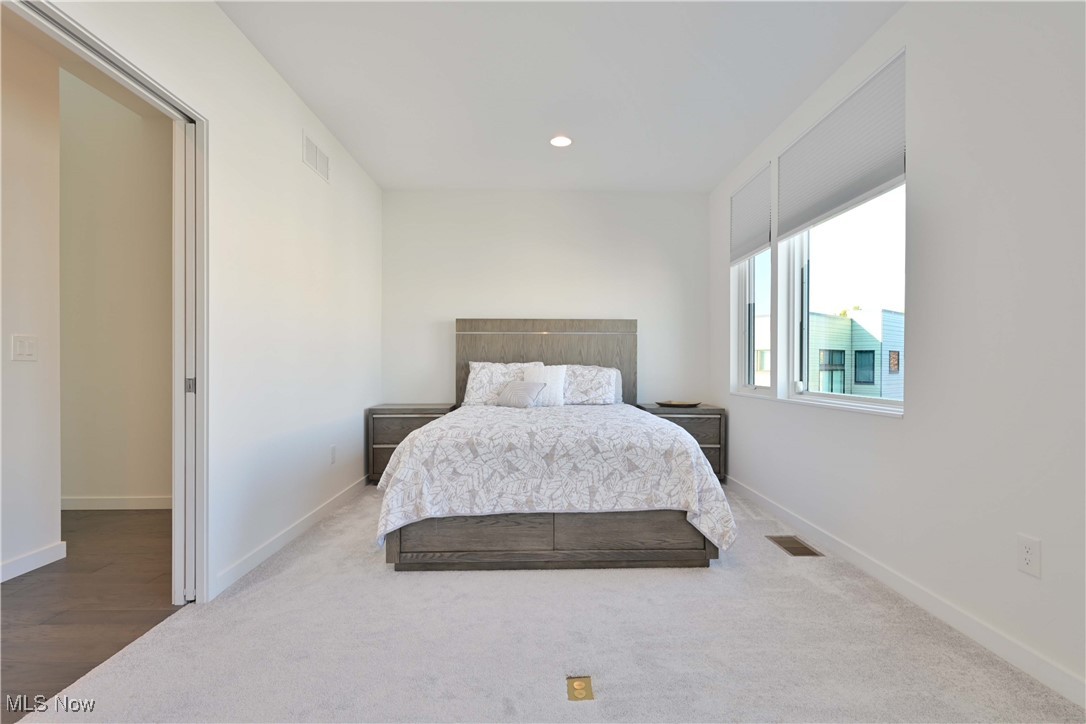 18875 Riversouth Terrace, Unit 35 Cleveland, OH 44126 - Photo 23 of 37 Carpeted bedroom featuring baseboards and recessed lighting