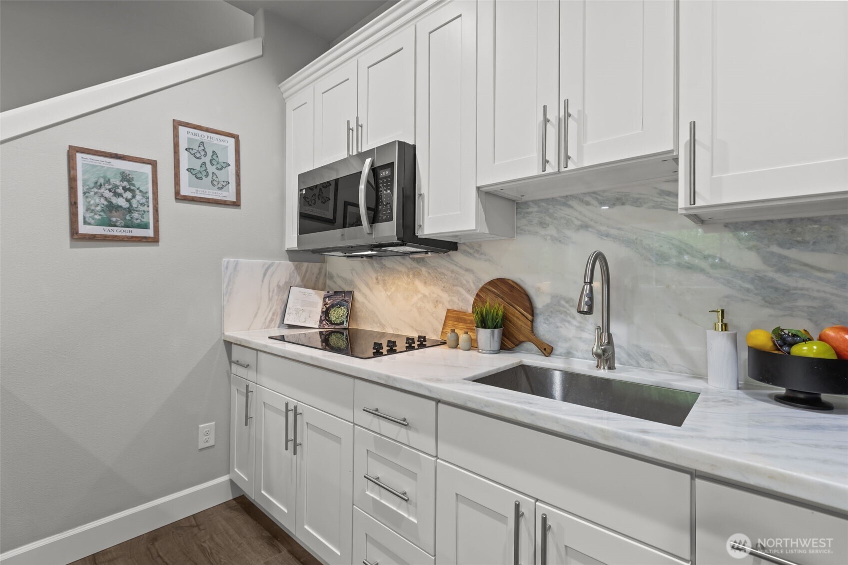 18231 3rd Drive Southeast Bothell, WA 98012 - Photo 33 of 40 a kitchen with stainless steel appliances granite countertop white cabinets a sink and dishwasher