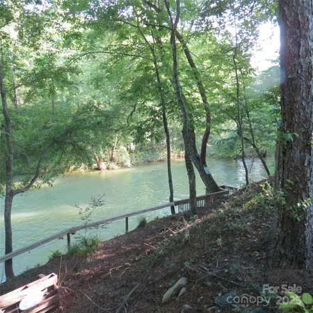 a view of lake with green space