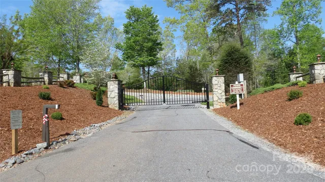 a view of a street with houses on both side