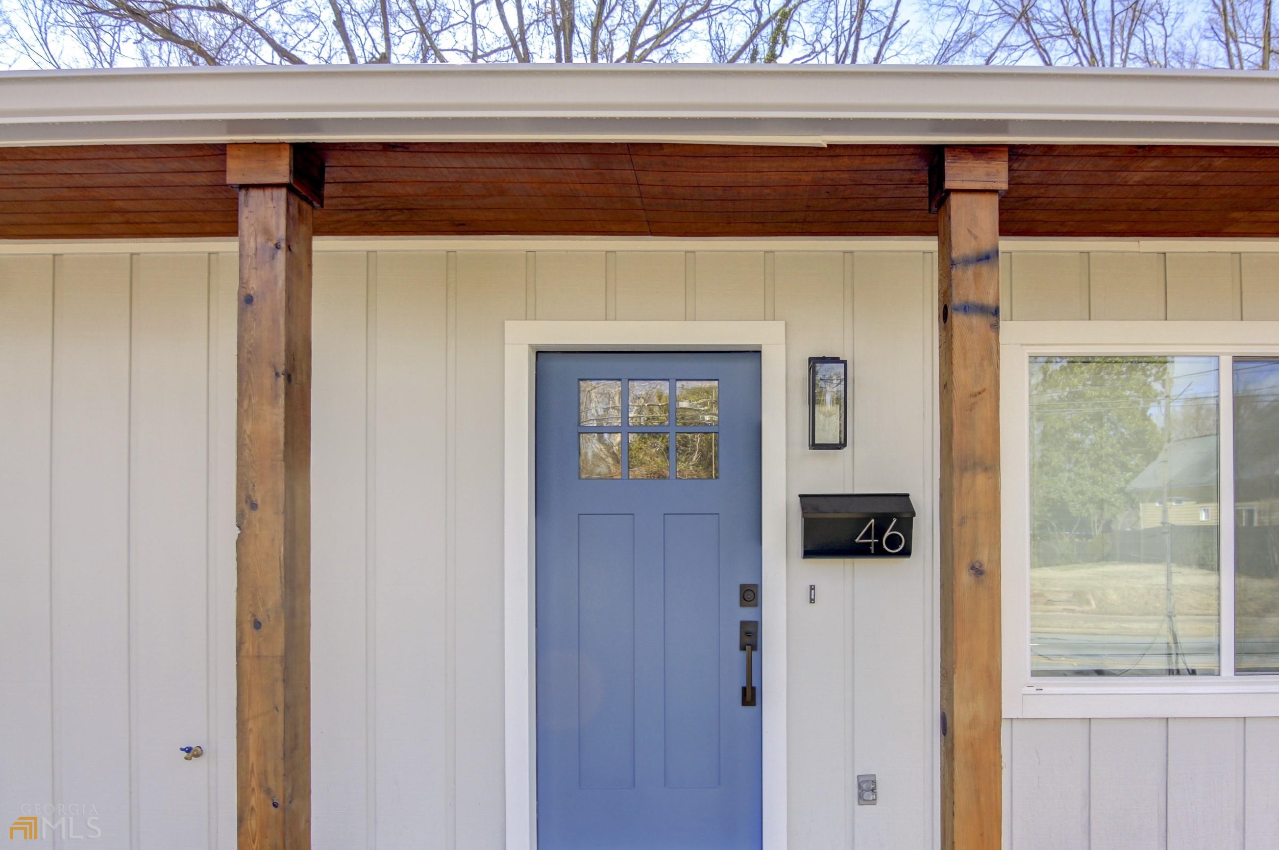 48 Clark Street, Unit 48 Newnan, GA 30263 - Photo 1 of 1 a front view of a house with white walls