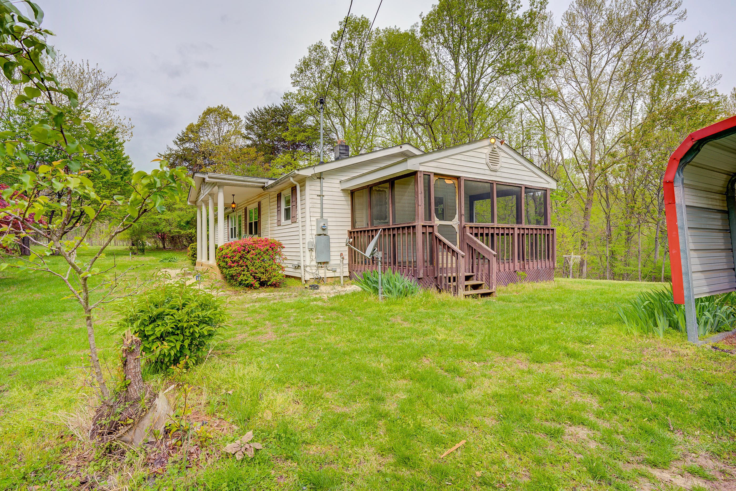 3110 Thomasson Mill Road Goodview, VA 24095 - Photo 2 of 35 a view of a house with a yard