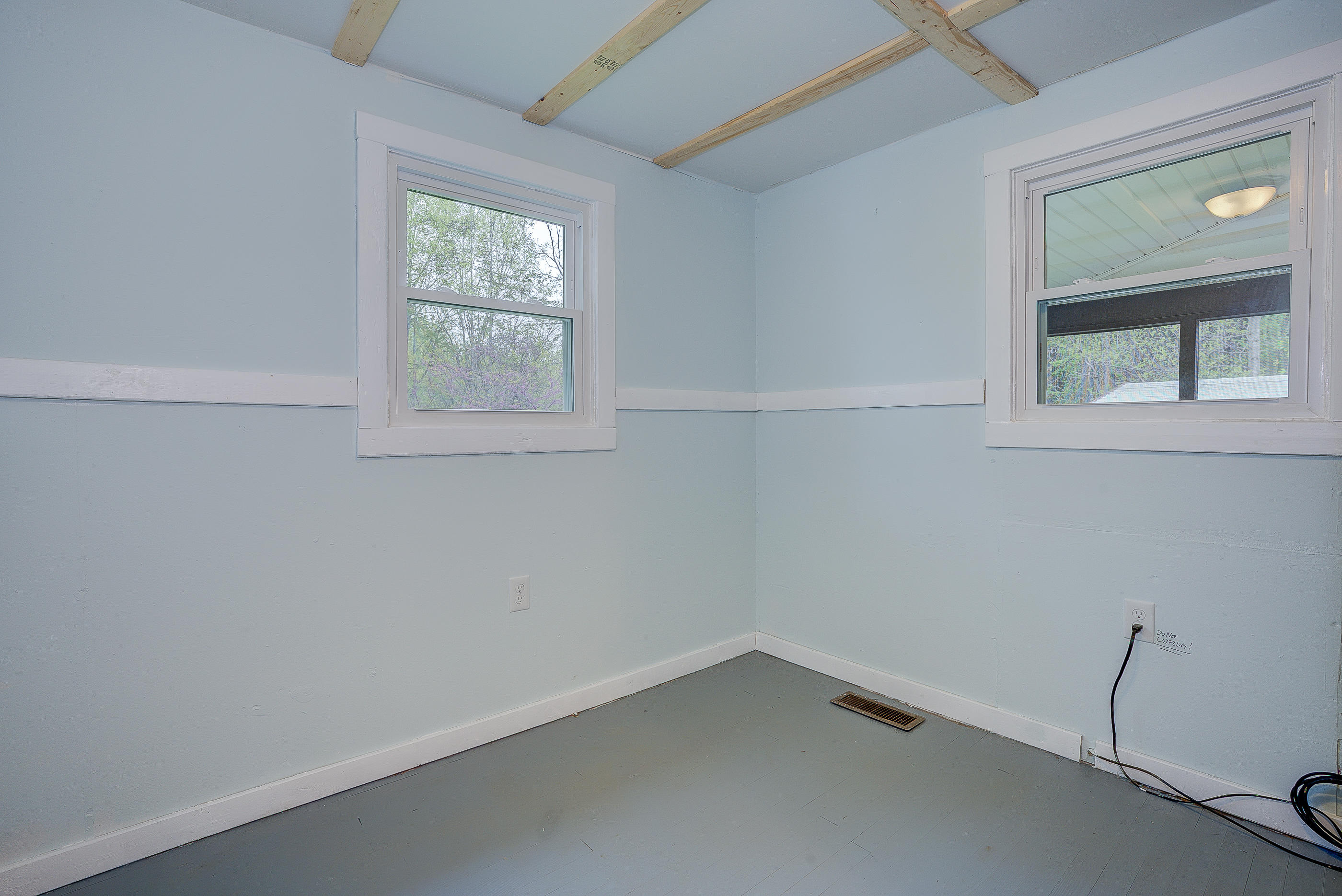 3110 Thomasson Mill Road Goodview, VA 24095 - Photo 15 of 35 an empty room with a window