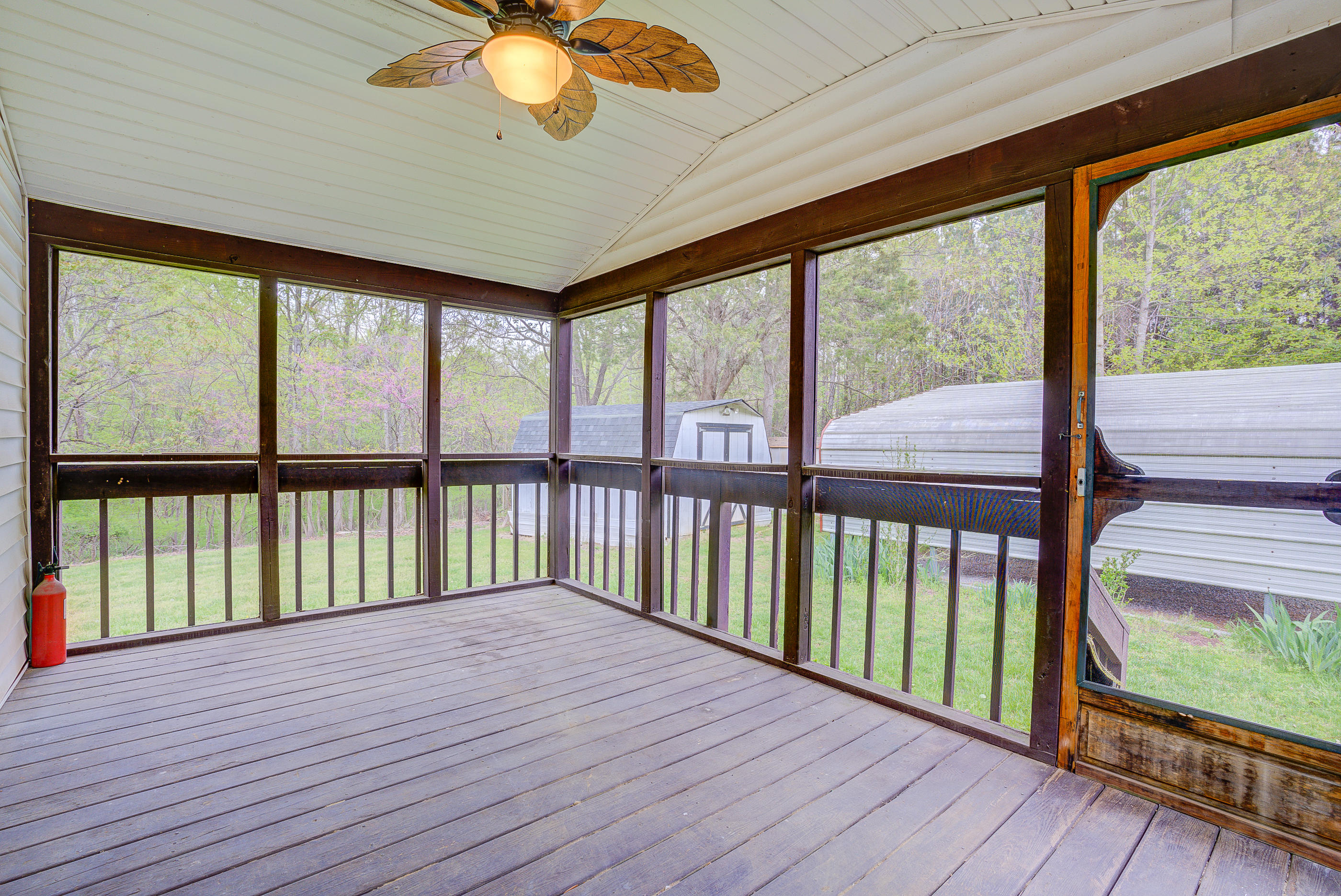 3110 Thomasson Mill Road Goodview, VA 24095 - Photo 16 of 35 a view of a balcony with wooden floor