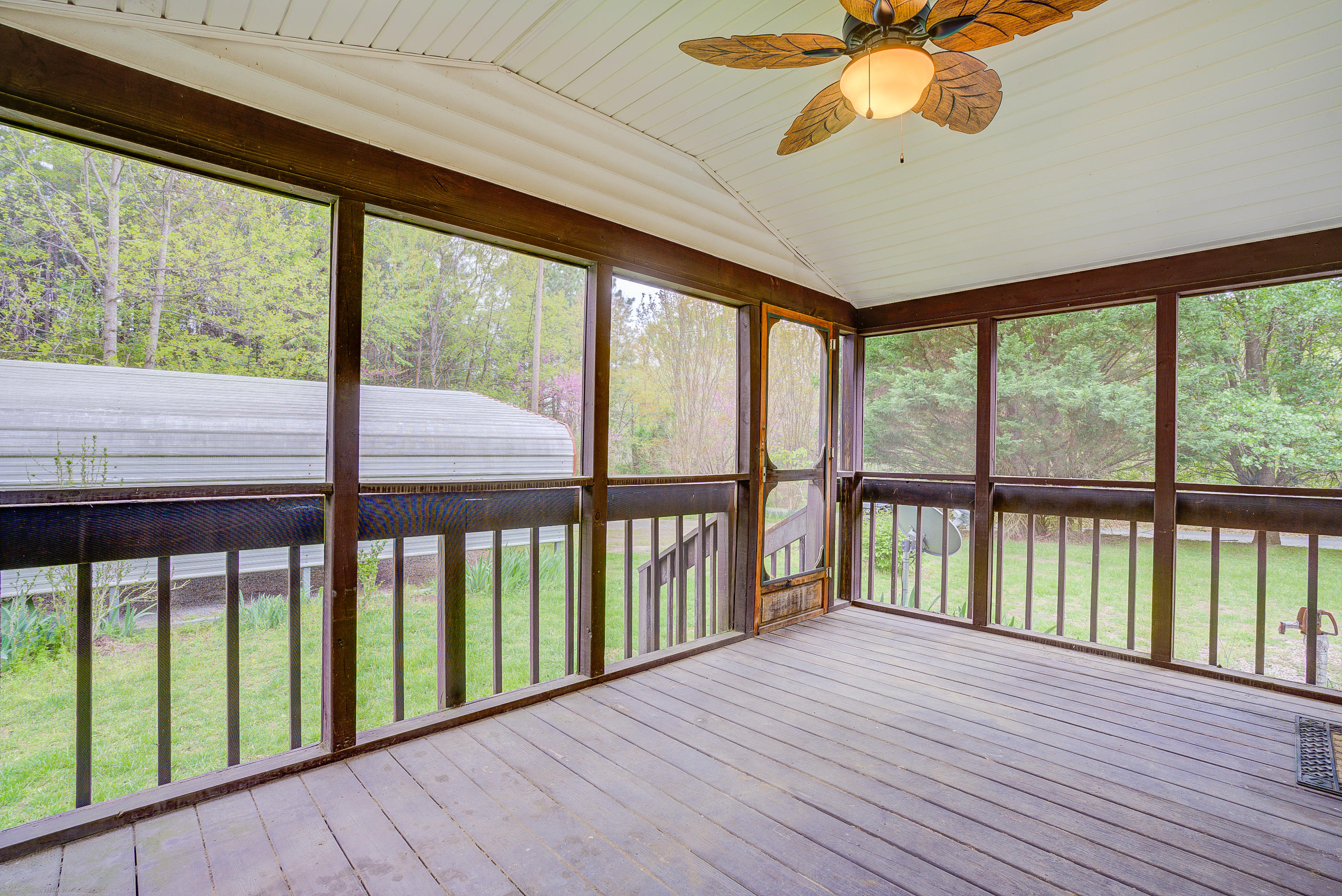 3110 Thomasson Mill Road Goodview, VA 24095 - Photo 17 of 35 a view of a balcony with wooden floor