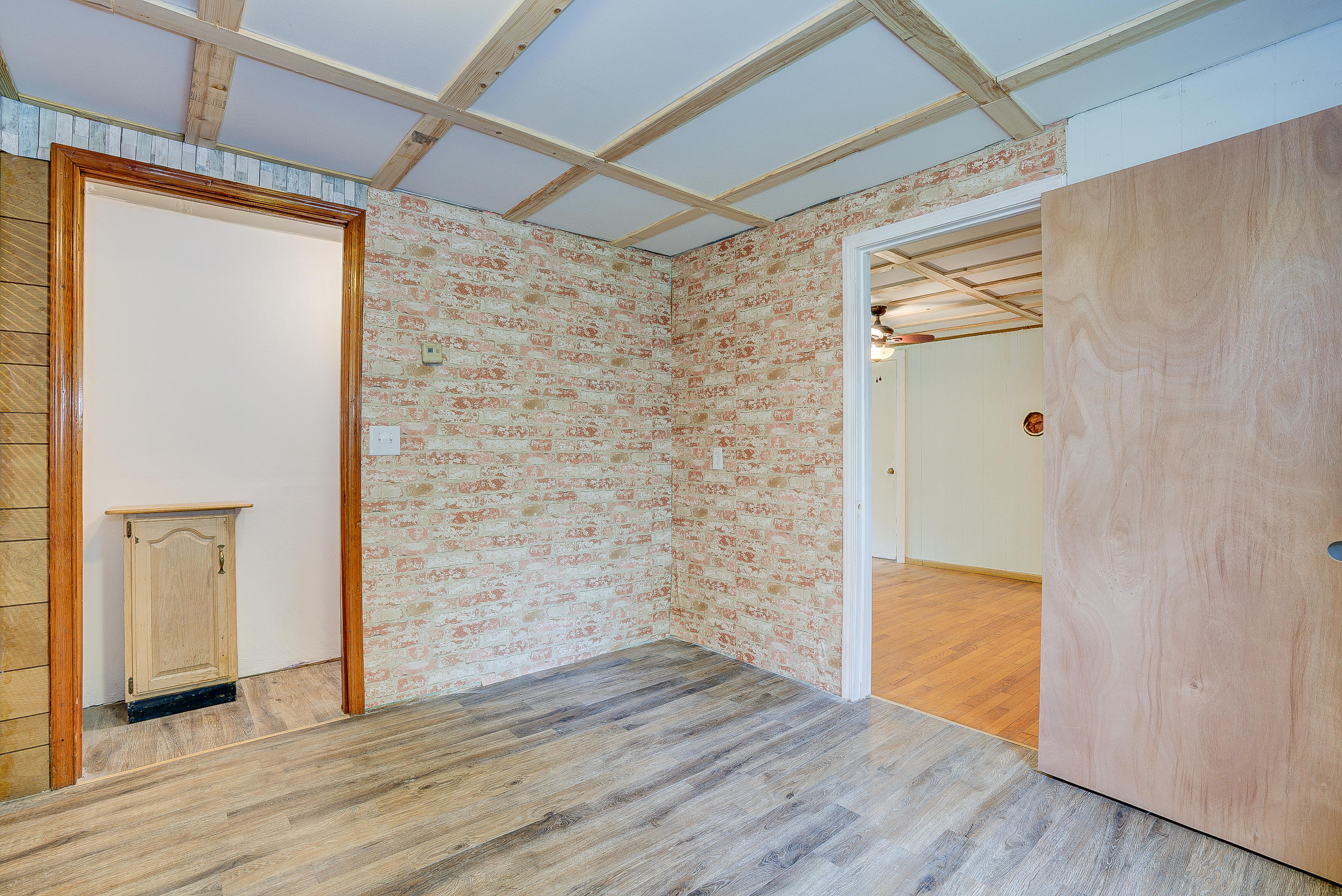3110 Thomasson Mill Road Goodview, VA 24095 - Photo 20 of 35 a view of empty room with wooden floor
