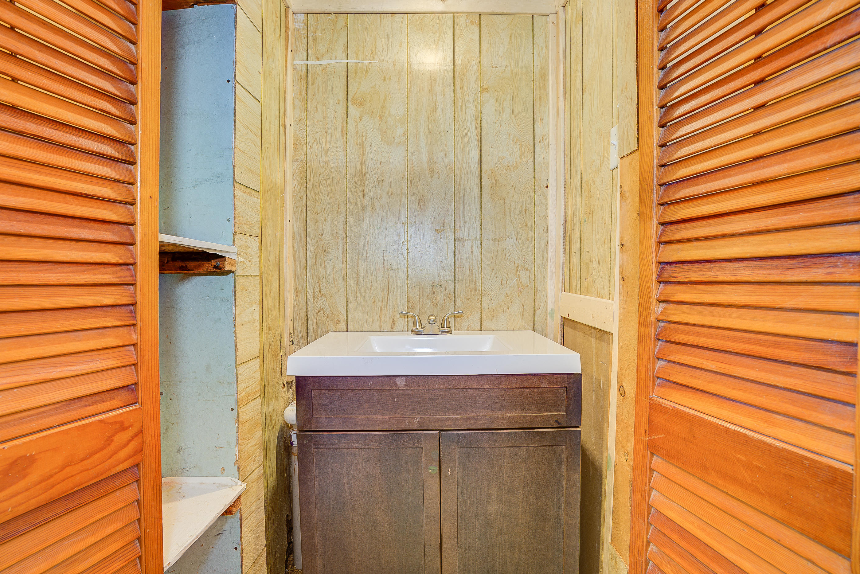 3110 Thomasson Mill Road Goodview, VA 24095 - Photo 22 of 35 a bathroom with a shower and a sink