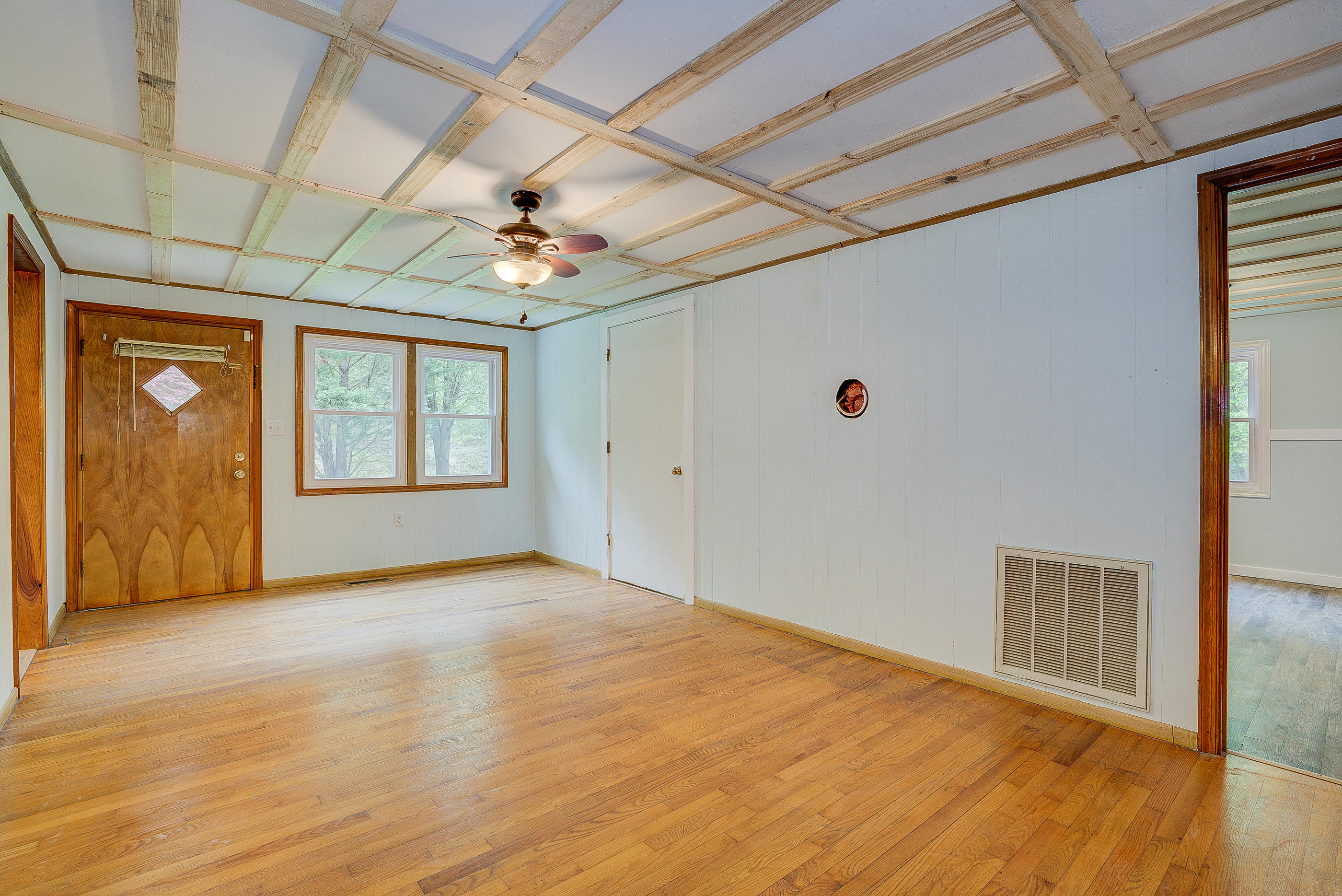 3110 Thomasson Mill Road Goodview, VA 24095 - Photo 6 of 35 a view of an empty room with a window