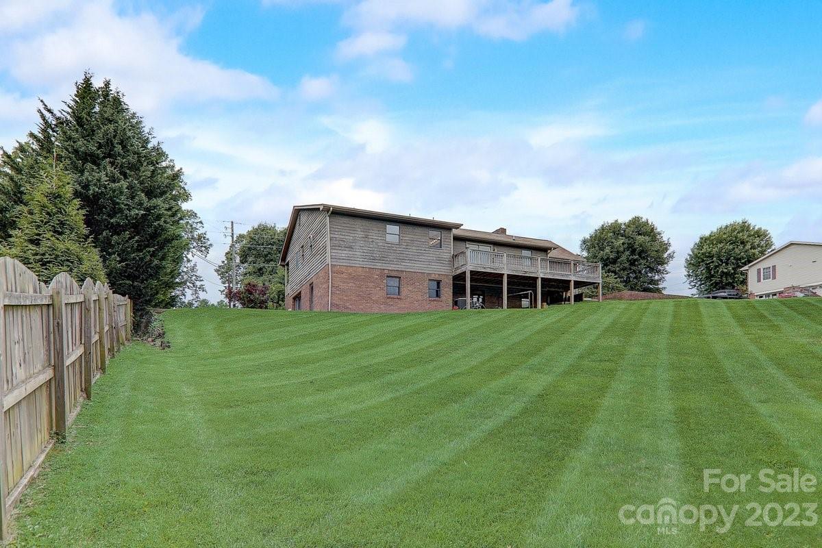 110 Oak Hill Road Candler, NC 28715 - Photo 21 of 37 a front view of a house with a yard