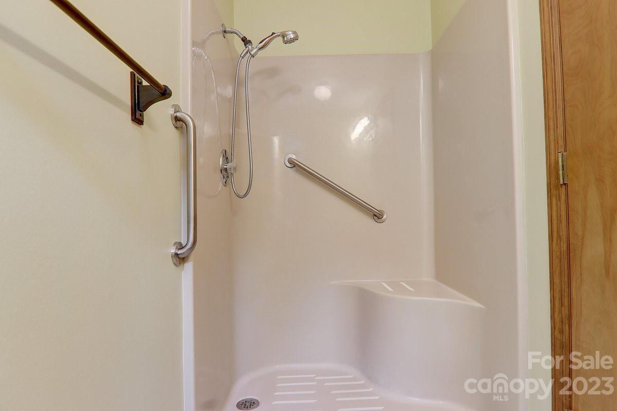 110 Oak Hill Road Candler, NC 28715 - Photo 34 of 37 a bathroom with a shower