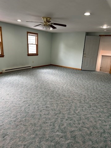 7 Ridgeland Road, Unit 1 Shrewsbury, MA 01545 - Photo 14 of 20 an empty room with windows