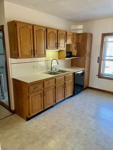 7 Ridgeland Road, Unit 1 Shrewsbury, MA 01545 - Photo 18 of 20 a kitchen with stainless steel appliances granite countertop a sink and cabinets