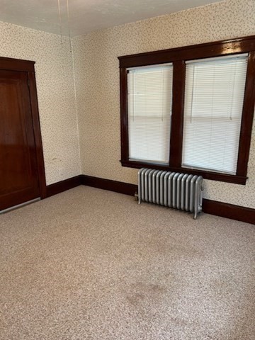 7 Ridgeland Road, Unit 1 Shrewsbury, MA 01545 - Photo 4 of 20 a view of an empty room with a window