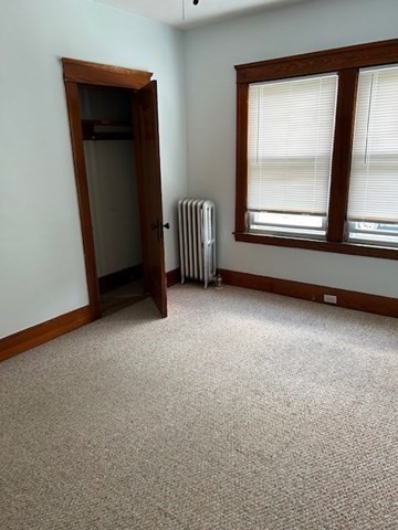 7 Ridgeland Road, Unit 1 Shrewsbury, MA 01545 - Photo 8 of 20 an empty room with windows