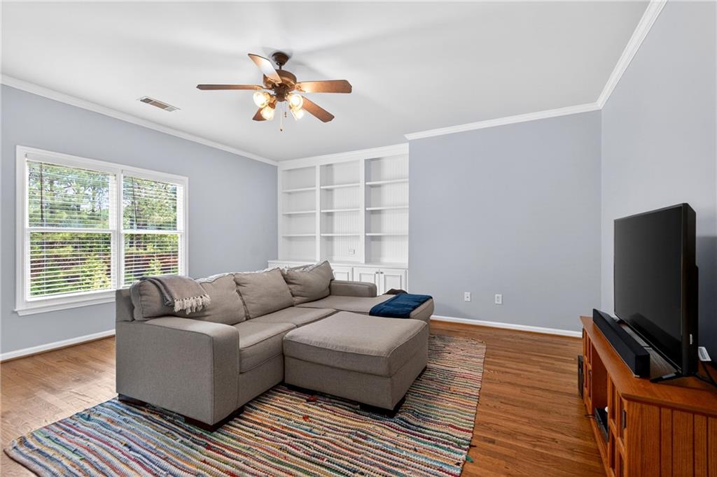 130 Providence Oaks Pointe Milton, GA 30004 - Photo 63 of 89 a living room with furniture and a flat screen tv