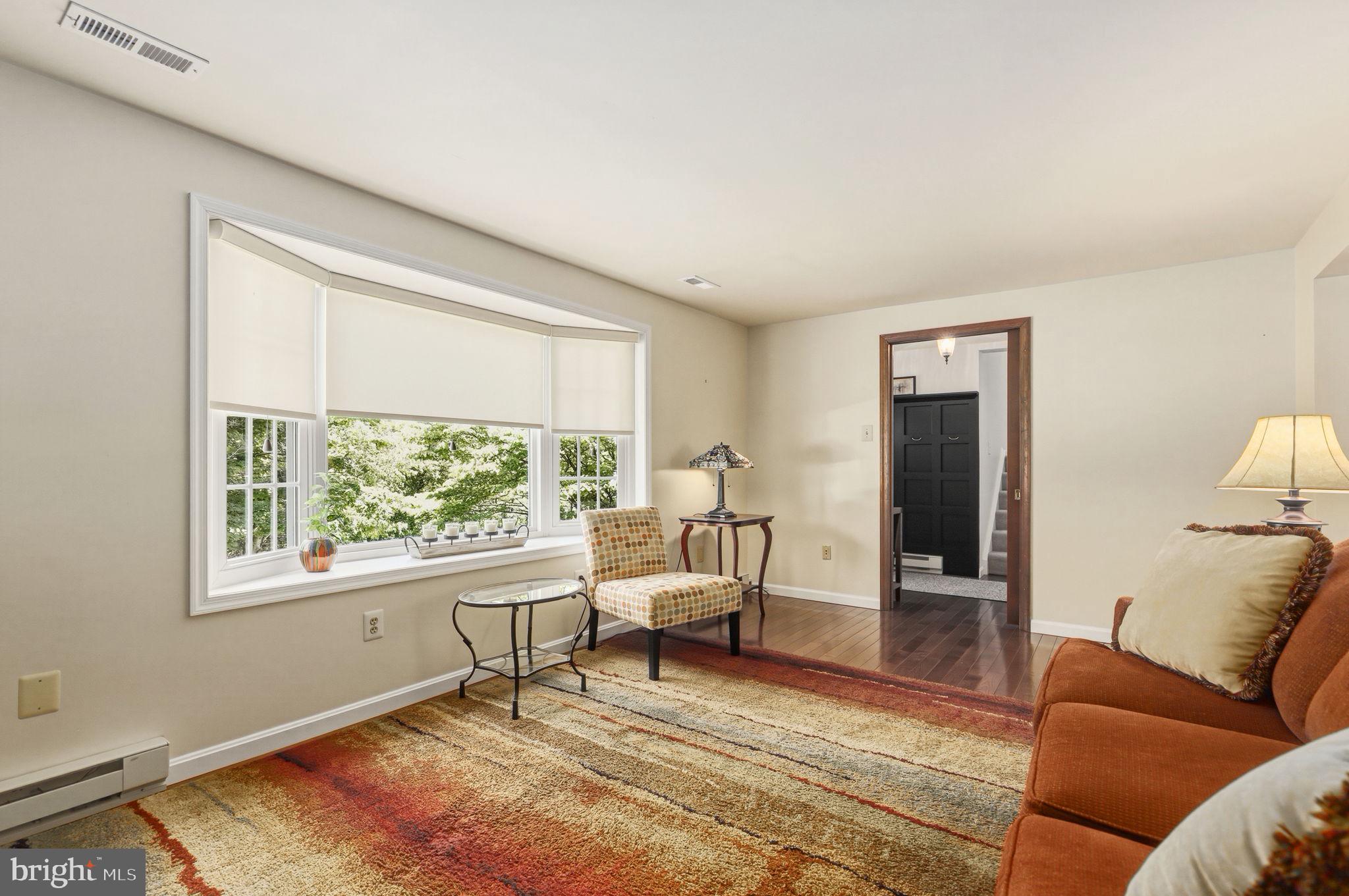 6336 Boyers Mill Road New Market, MD 21774 - Photo 15 of 49 a living room with furniture and a window