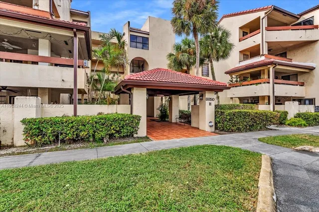 a front view of a building with an outdoor seating