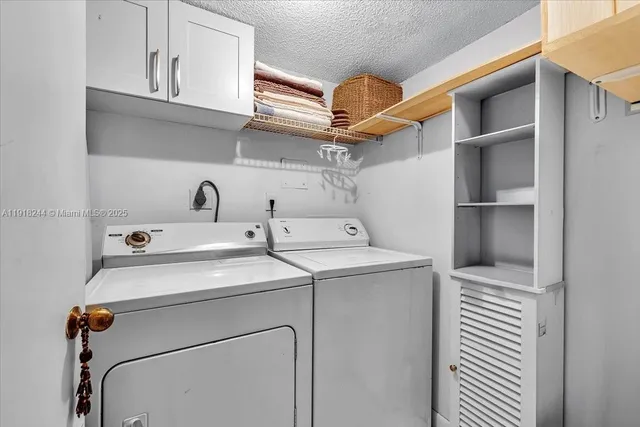 a view of an house with swimming pool garden and trees