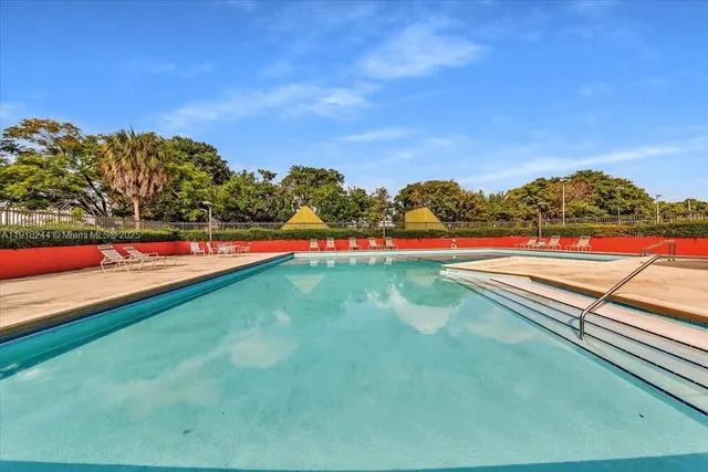 a view of outdoor space yard and swimming pool