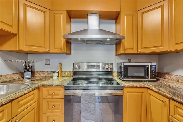 a view of a livingroom with furniture and chandelier
