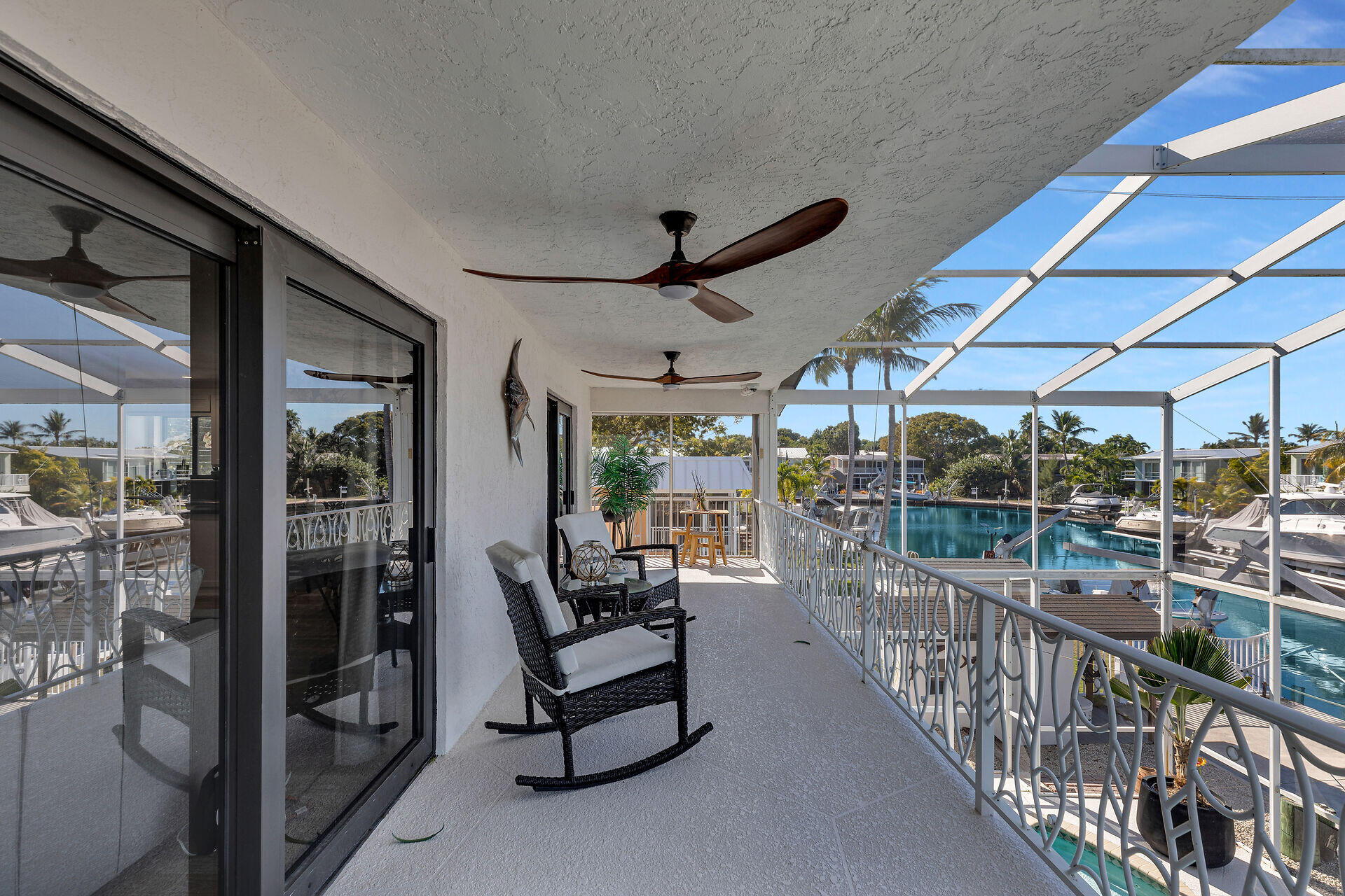 782 Bostwick Drive Key Largo, FL 33037 - Photo 11 of 63 a view of living room and balcony