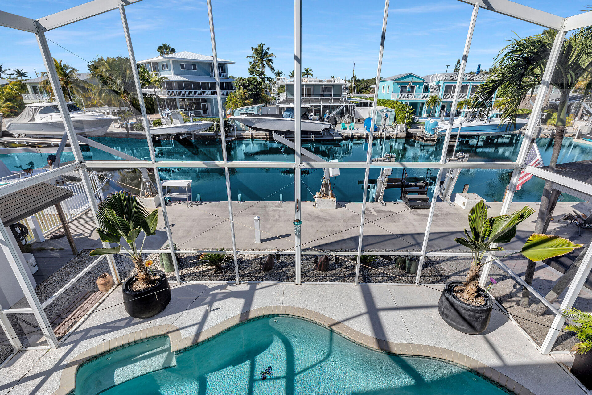 782 Bostwick Drive Key Largo, FL 33037 - Photo 13 of 63 a view of a chairs and table in patio