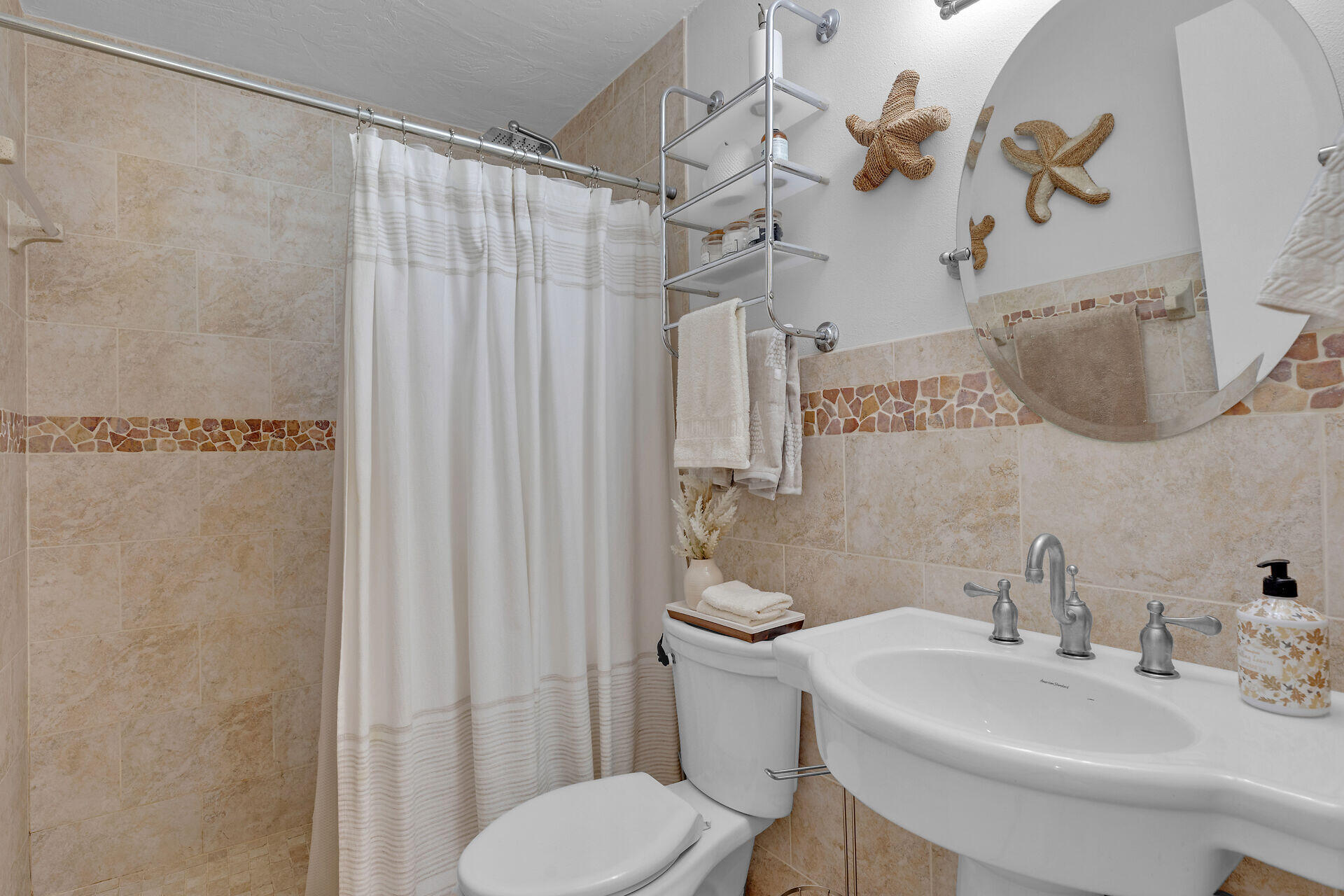 782 Bostwick Drive Key Largo, FL 33037 - Photo 37 of 63 a bathroom with a sink toilet and shower