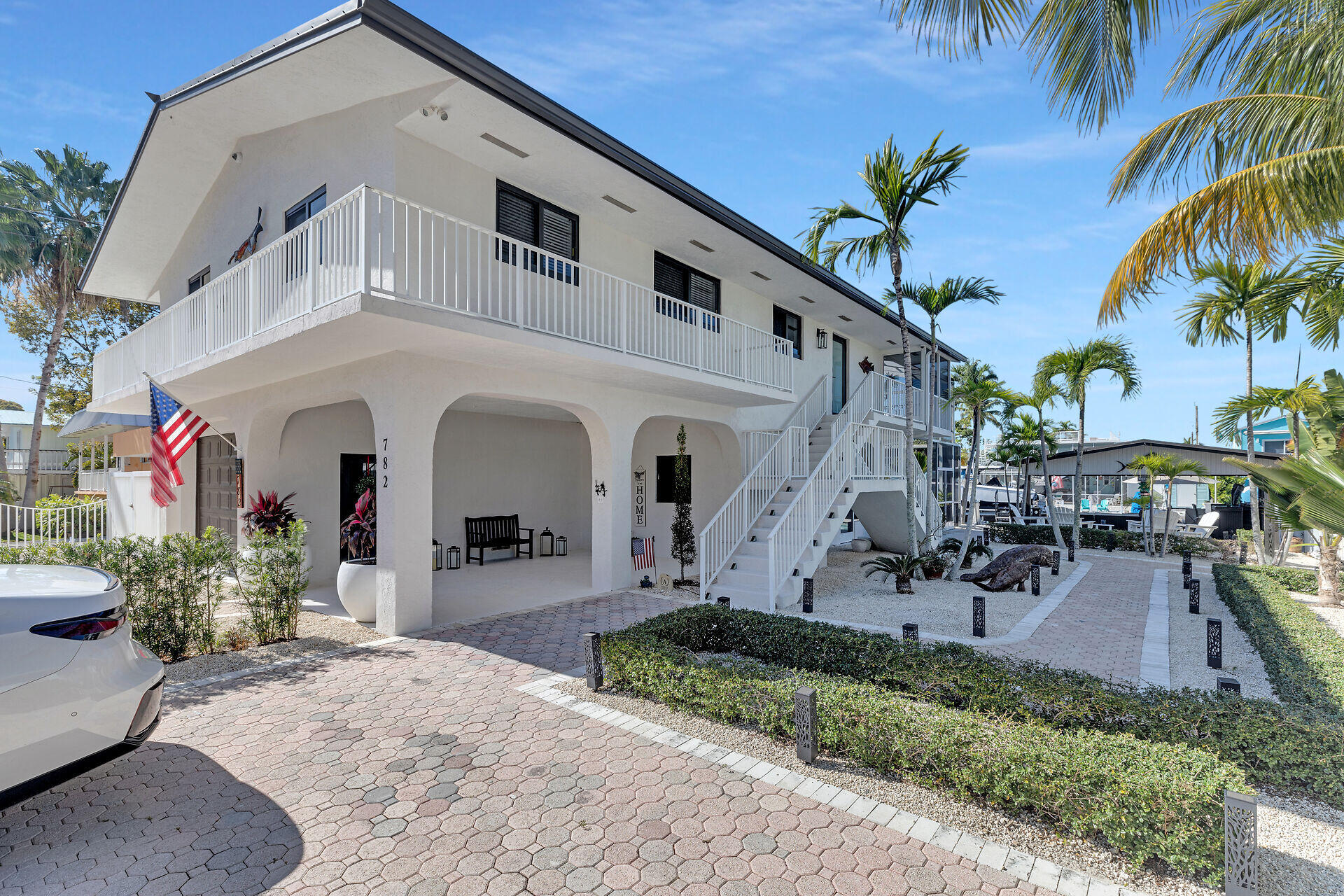 782 Bostwick Drive Key Largo, FL 33037 - Photo 39 of 63 a front view of a house with patio