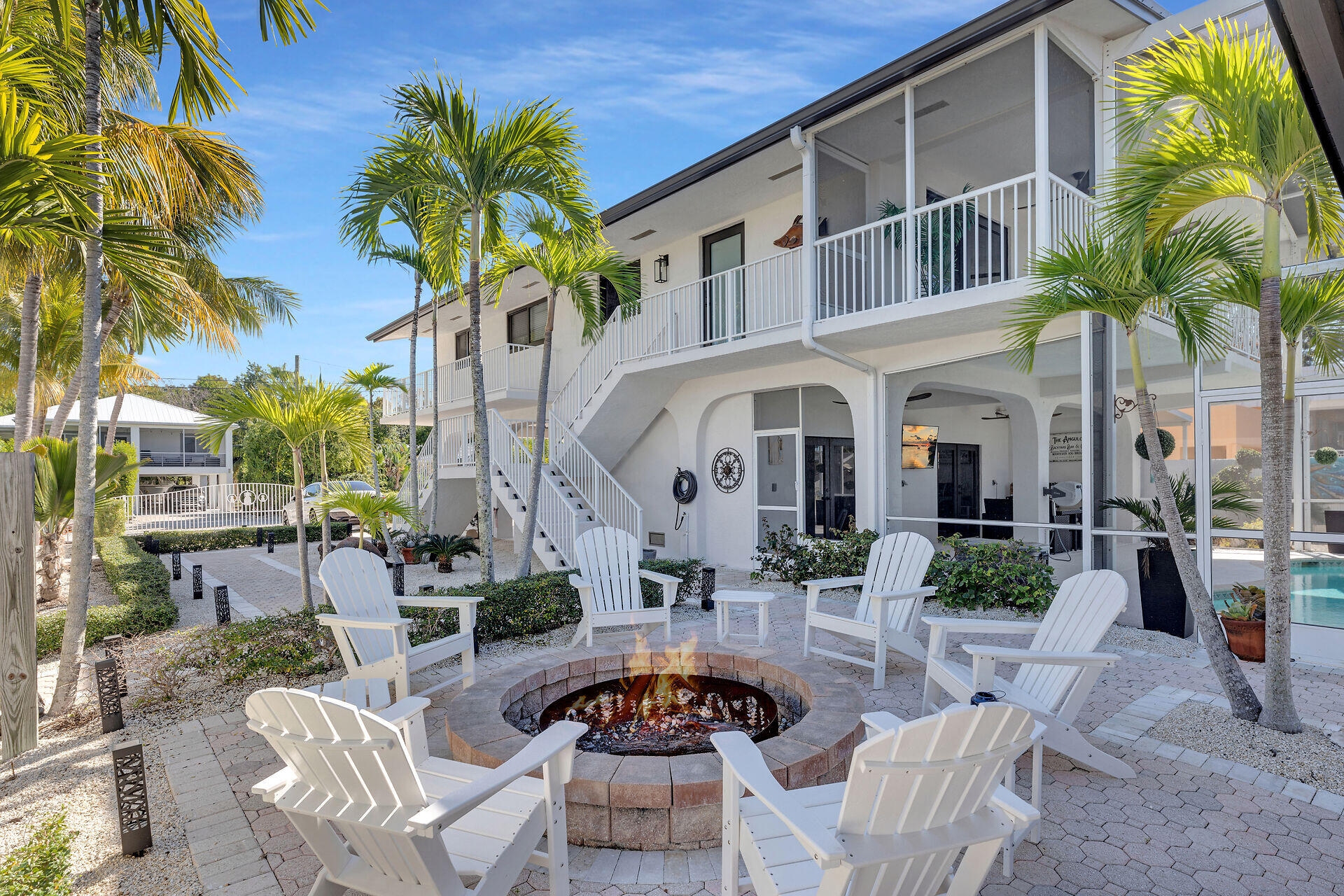 782 Bostwick Drive Key Largo, FL 33037 - Photo 42 of 63 a view of a house with backyard and sitting area